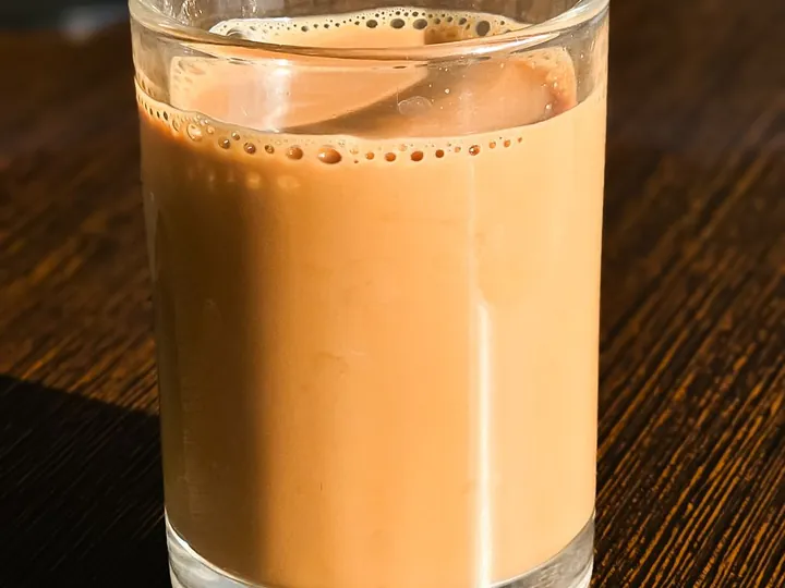 A glass of milky pulled tea